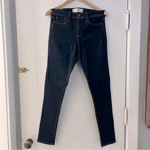 Hollister high rise super skinny jeans, 7R , 28W, dark wash, zipper fly